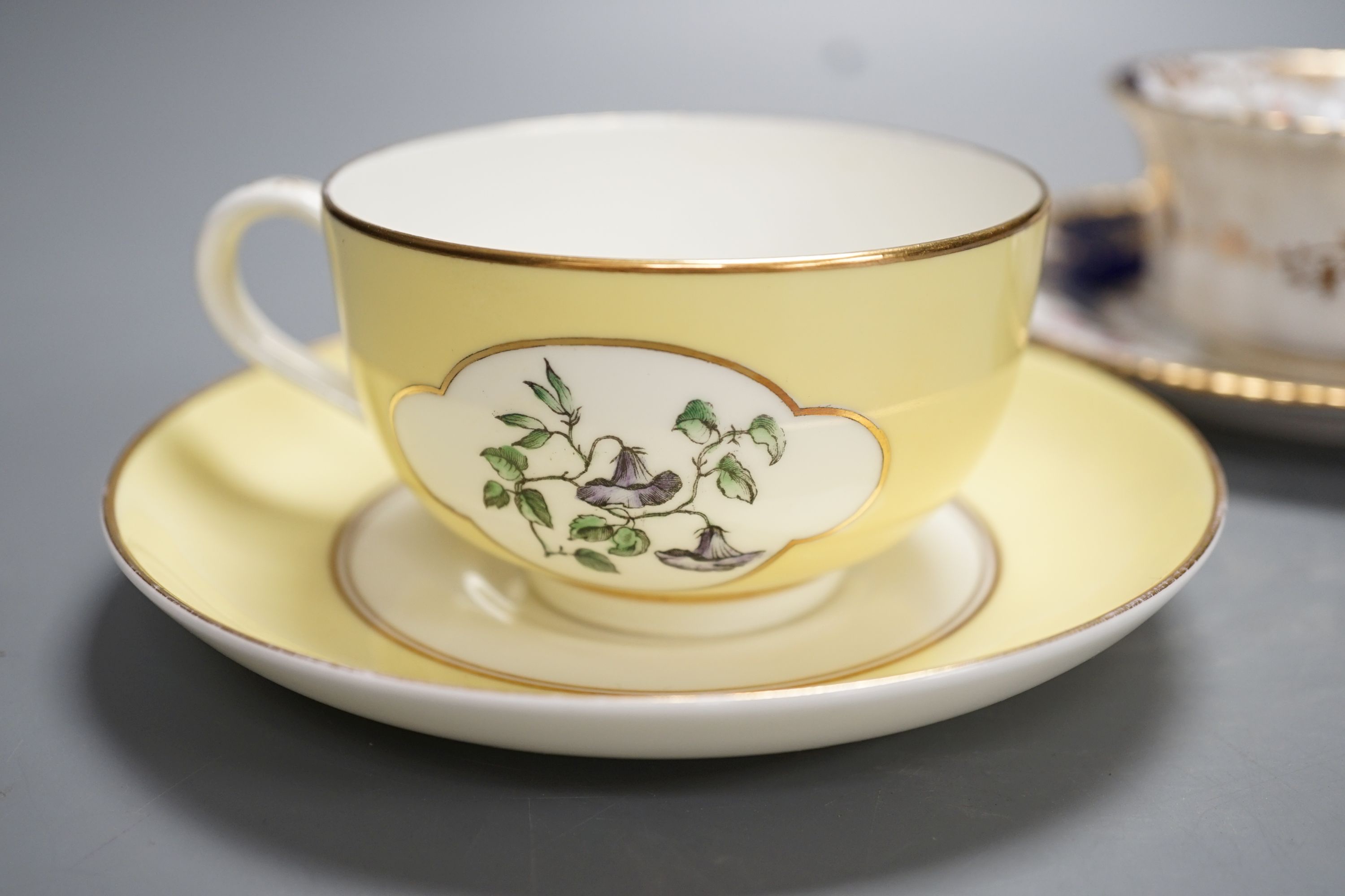 Royal Worcester for Aspreys - a set of six flower painted cups and saucers and four sideplates together with a Coalport part tea set